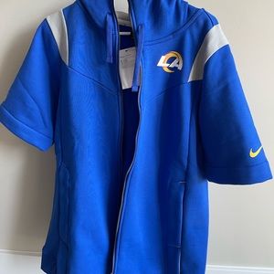 Los Angeles Rams Nike | NFL On Field Apparel, half sleeve zip up jacket, size M.